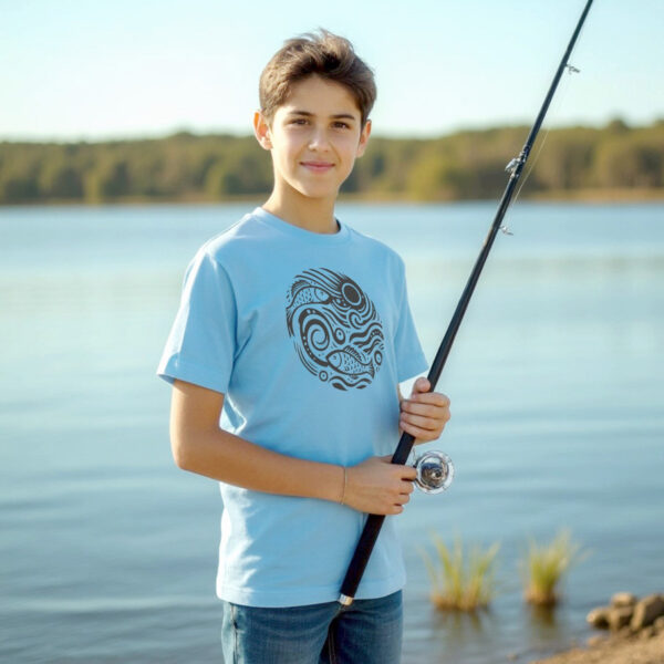 boy wearing Cast a Line shirt with fish and waves design in sky blue