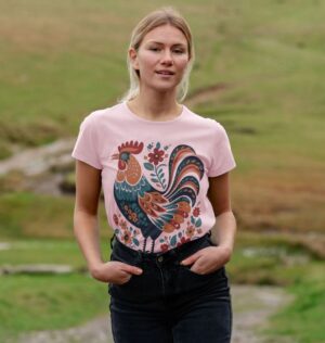 woman wearing Folk Art Rooster organic cotton tee in pink