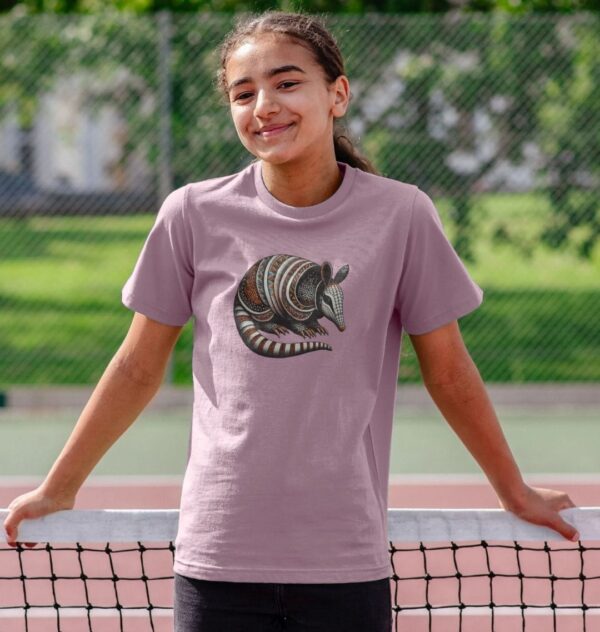 girl wearing the Banded Armadillo organic cotton t-shirt in mauve color