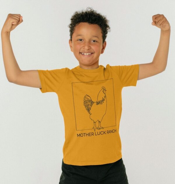 boy wearing the Egg-cellent t-shirt in mustard