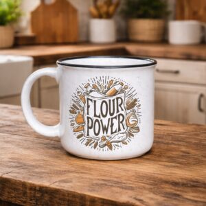 Flour Power 15oz. ceramic mug on a wooden kitchen counter