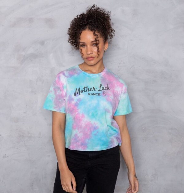 woman wearing organic cotton tie-dye Mother Luck Ranch boxy tee