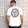 man wearing the Molon Labe t-shirt in white featuring the Mother Luck Ranch brand on the front and heraldic eagle emblem in the back with "Molon Labe" in Greek font on top of the emblem and Thomas Jefferson quote "I prefer dangerous freedom over peaceful slavery" on the bottom of the emblem.