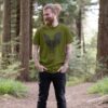 man wearing folk art rooster t-shirt in moss green color