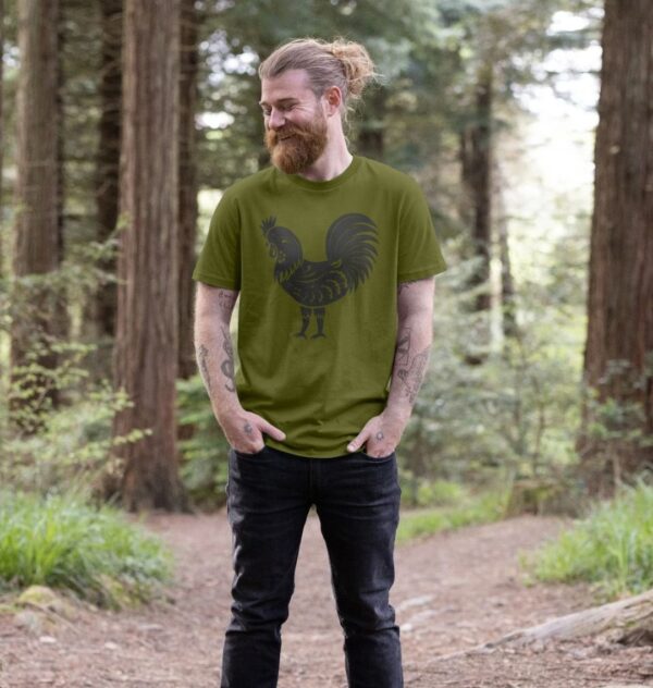 man wearing folk art rooster t-shirt in moss green color