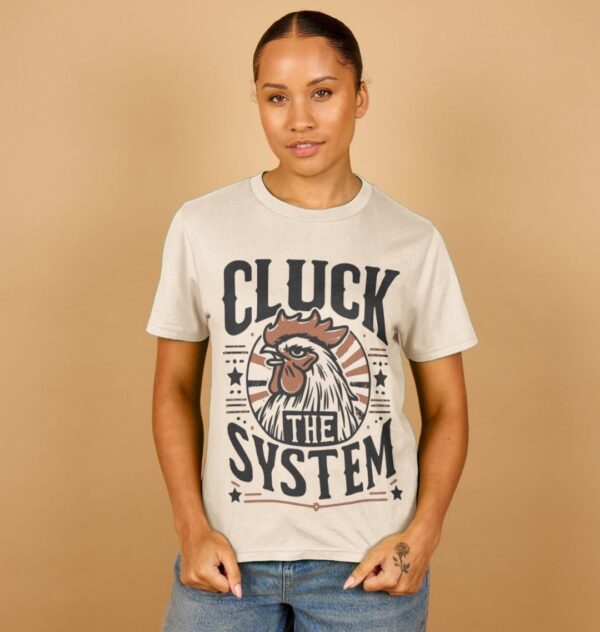 Woman wearing the Women's "Cluck The System" Organic Cotton Classic Tee in Oat