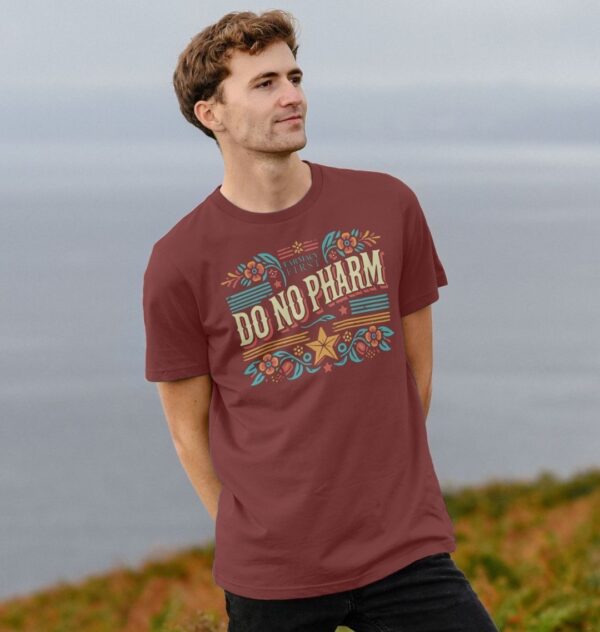 Man wearing the Do No Pharm Organic Cotton T-Shirt in Red Wine Color