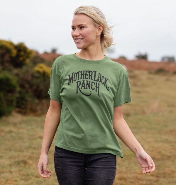 Woman wearing the Organic Cotton Old West MLR Logo Relaxed Tee in Sage Green