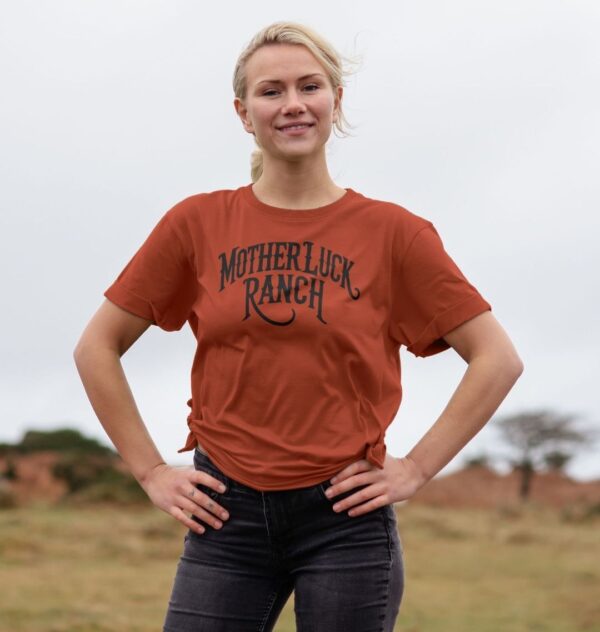 Woman wearing the Organic Cotton Old West MLR Logo Relaxed Tee in Rust