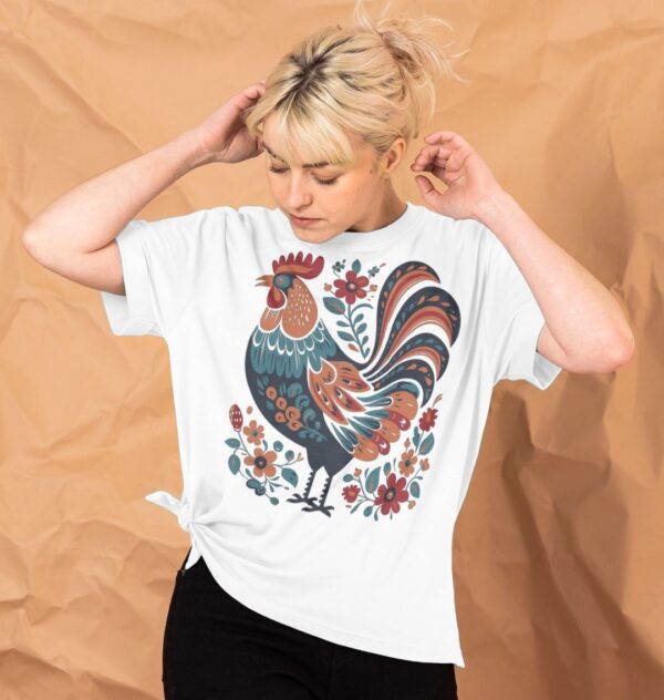 woman wearing the Women's Folk Art Rooster Organic Cotton Relaxed Tee in White