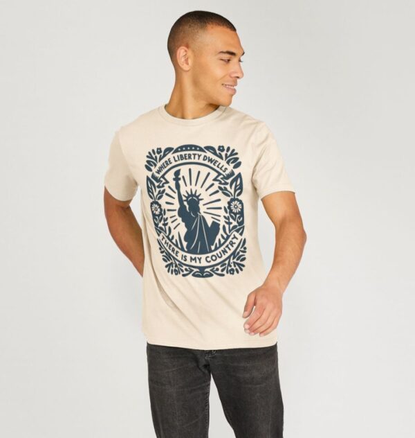 Man wearing the Oat Color Organic Cotton T-Shirt "Where Liberty Dwells There Is My Country" Benjamin Franklin Quote