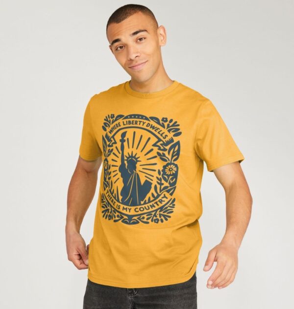 Man wearing the Mustard Yellow Organic Cotton T-Shirt "Where Liberty Dwells There Is My Country" Benjamin Franklin Quote