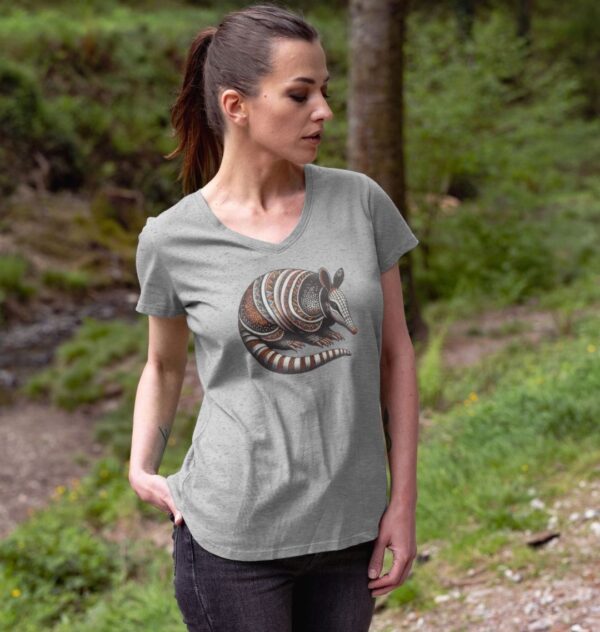 Woman in woods wearing the Women's Banded Armadillo Organic Cotton V-Neck Tee in Athletic Grey