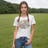 woman with braids wearing white t-shirt with "Flour Power" graphic