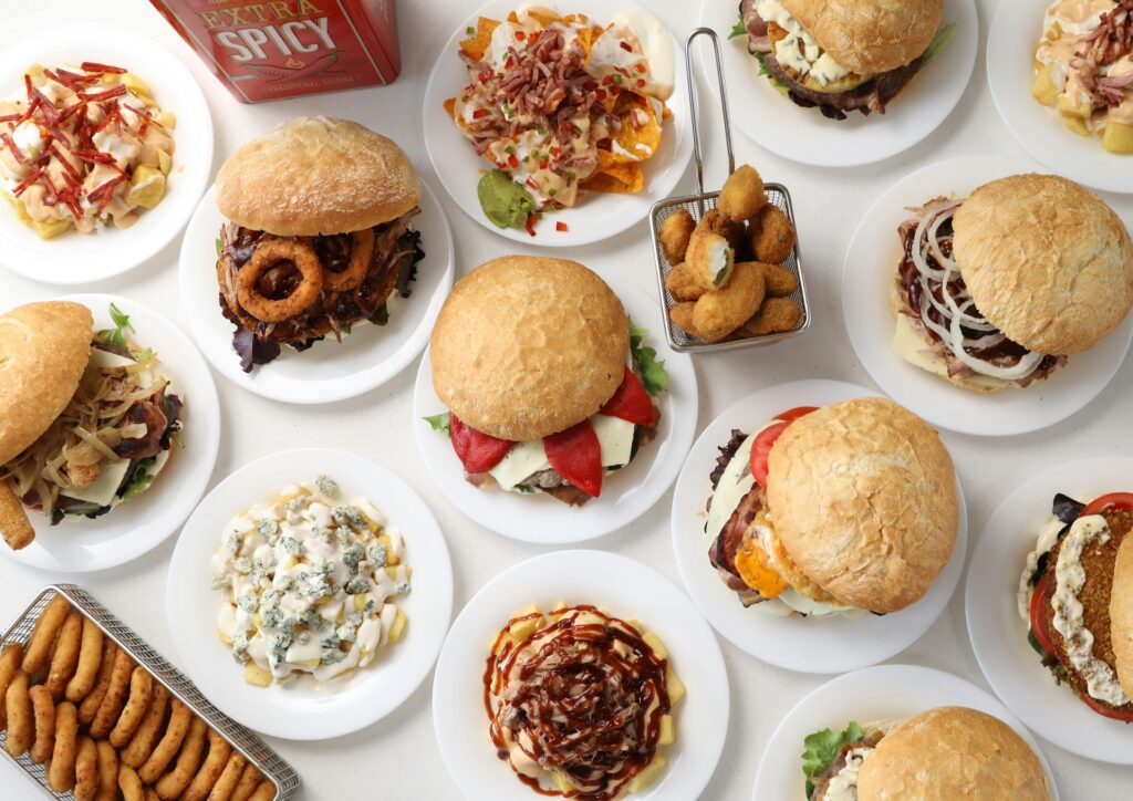 array of variety of hamburgers, chicken nuggets, and other foods