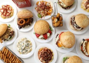 array of variety of hamburgers, chicken nuggets, and other foods