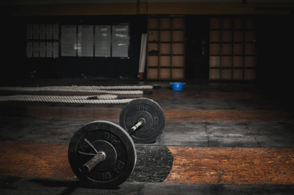 barbell on an empty gym floor