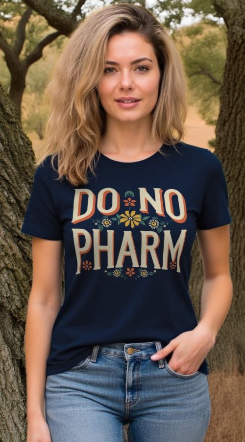 woman under oak trees wearing the "Do No Pharm" scoop neck tee in deep navy color